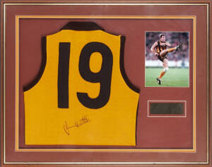 JASON DUNSTALL (Hawthorn), display comprising signed Hawthorn jumper, window mounted with action photograph and caption, framed & glazed, overall 95x77cm.