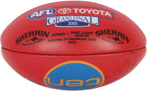 SYDNEY SWANS: 2005 AFL Grand Final "Sherrin" match football signed by coach Paul Roos & captain Barry Hall.