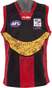 AFL INDIGENOUS ALL STARS: c2005 Indigenous All Stars jumper with c24 signatures including Adam Goodes, Michael McLean, Daniel Wells, Michael O'Loughlin & Troy Cook. Together with Australian Football Indigenous Team of the Century covers [20] & "Aboriginal