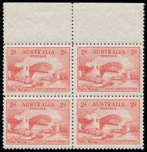 Pre-Decimals: 1932 Sydney Harbour Bridge 2d red marginal block of 4 from the top of the sheet with a single "Plate Dot" at upper-right, unmounted. Unlisted in the ACSC. There is speculation that dots of this nature were to assist with aligning the perfora