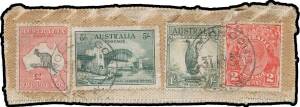 Postal History: 1932 piece from a hessian parcel-wrapping with outstanding franking of Kangaroos Small Multiple Wmk Â£2 & 5/- Sydney Harbour Bridge plus KGV 2d red & 1/- Large Lyrebird all tied by fine 'WOLLONGONG/31MY32/NSW' cds, a few minor imperfection