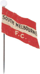 1908 Wills "Football Flags Shaped with Pins" [1/27 known] - South Melbourne. G/VG condition (with original pin, blank reverse). Rarity 8.