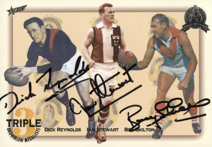 1996 Select "Hall of Fame" Platinum Special "Triple Brownlow Medallists" signed by Dick Reynolds, Ian Stewart & Bobby Skilton, No.062/100. Together with modern photo of the three together. G/VG.