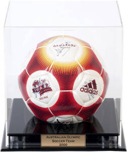 2000 AUSTRALIAN OLYMPIC SOCCER TEAM: 'adidas' football with c21 signatures, in perspex display case, 26x26x29cm. The team included Mark Viduka, Stan Lazaridis, Josip Skoko, Hayden Foxe, Kasey Wehrman & Brett Emerton.