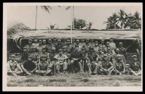 New Guinea: c.1945 real photo postcards showing Japanese Prisoners of War 1) posed group of 40 in front of hut; and 2) larger group marching on road; both annotated "Jap POW Rabaul WW2" on back, unused. Rarely seen images. (2)