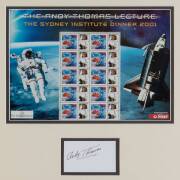 ANDY THOMAS (Australian-born NASA astronaut), display comprising signature on card, window mounted with Australia Post 2001 "Andy Thomas Lecture" sheetlet, framed & glazed, overall 54x49cm.