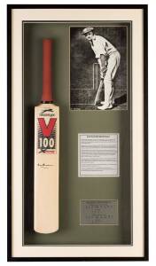 DON BRADMAN, signature on full size "Slazenger" Cricket bat, in attractive display case with photo of Bradman, overall 58x105cm. With CoA.