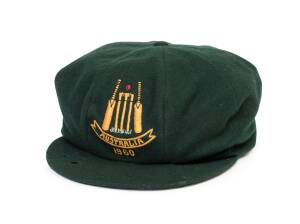 JACK POTTER'S "BAGGY GREEN" AUSTRALIAN CAP, from 1960 Second XI tour to New Zealand, green wool, embroidered logo with bats, ball & stumps, "AUSTRALIA" & "1960" on front on front. Good match-used condition (two small wear holes in brim). Ex Jack Potter co