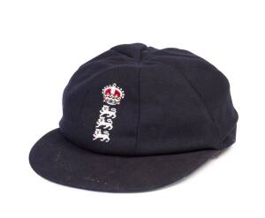 GEOFF BOYCOTT'S ENGLAND HOME TEST CAP, navy blue wool, embroidered Crown over Three Lions on front, named inside "Geoff Boycott". Good condition. [Geoff Boycott played 108 Tests 1964-82].