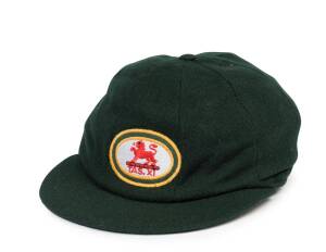 DAVID BOON'S TASMANIA CRICKET CAP, from 1982-83, Baggy Green with embroidered "(Lion)/ TAS.XI" badge on front, endorsed inside "D.Boon". Good condition. [David Boon played 107 Tests & 181 ODIs 1984-96, and for Tasmania 1978-99].