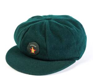 GARY WALLACE'S ZIMBABWE TEST CAP, from 1985-86, green wool with small Zimbabwe badge on front, named "Gary Wallace" on label. [Gary Wallace played for Rhodesia 1978-80, and Zimbabwe 1980-96].