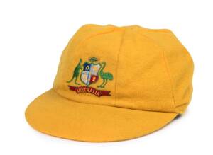 ALLAN BORDER'S AUSTRALIAN "BAGGY YELLOW" ONE DAY INTERNATIONAL CAP, from 1987-88 season, yellow wool, embroidered Australian Coat-of-Arms on front, Albion label inside endorsed "A.Border". Fine condition. [Allan Border played 273 ODIs 1978-94, including a