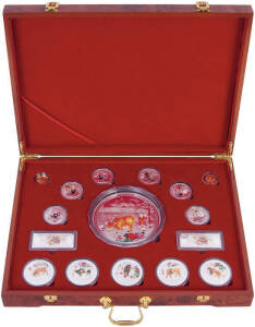 2009 Year of the Ox 16 piece set in various sizes to 500gms, proof like in a silver or gold finish, each piece showing different oxen or oxen undertaking various activities. In a polished wooden box issued by The People's Bank of China.