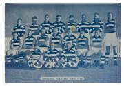 "Geelong Football Team 1934", souvenir desk plaque, made by Signum Speciality Co., ferrous metal back with cardboard stand, size 23x16cm.