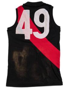 JAMES HIRD'S ESSENDON JUMPER, with VSFL & Nubrik badges, and number "49" on reverse. [James Hird played his first four games in the number "49" jumper in 1992].