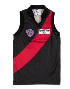 JAMES HIRD'S ESSENDON JUMPER, from his Brownlow Medal year, 1996, with AFL Centenary badge, and number "5" on reverse. {James Hird won the Brownlow Medal, was selected All-Australian, and won his third consecutive Essendon best & fairest, as well as Essen