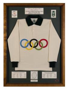 Sydney 2000/AFL display comprising Replica Guernsey (white with Olympic Rings in colour on front) as used in the Australian Football Demonstration Match played at the MCG during the 1956 Melbourne Olympics, limited edition 673/2000, attractively mounted, 