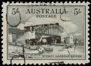 5/- Bridge commercially used, cancelled with part parcel roller cancel. Commercially used copies of this stamp are much scarcer than mint and CTO copies.