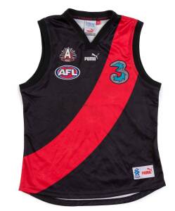 JAMES HIRD'S ESSENDON JUMPER, short sleeves, from 2006 Anzac Day match, with "1915 Anzac 2006", "AFL" & "3" logos, and number "5" on reverse. {James Hird won the Anzac Medal as best afield in 2000, 2003 & 2004}.