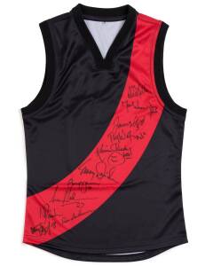 ESSENDON CAPTAINS: Essendon jumper with 11 signatures including David Hille, Mark Thompson, James Hird, Tim Watson, Kevin Sheedy, Terry Daniher, Simon Madden, Neale Daniher & Ron Andrews. Ex James Hird collection.
