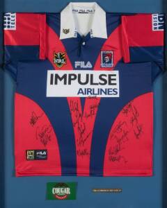 NEWCASTLE KNIGHTS, 2001 Premiers group including signed jersey with 18 signatures, framed & glazed, overall 88x108cm; 'Premiers 2001' display (105x78cm); 2001 Premiers aluminium stubbie holder; plus 2003 Select trading cards, framed (57x33cm). (4 items)