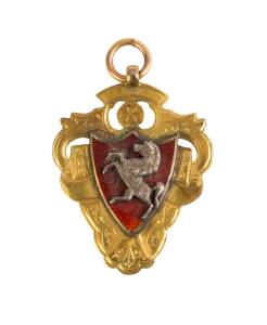 NORTHFLEET: 9ct gold & enamel medal with prancing horse on front, engraved on reverse, "W.K.L./ 07-8/ Div. 1./ Northfleet".