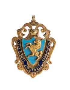 NORTHFLEET: 9ct gold & enamel medal/badge with prancing horse & "Kent County Football Association" on front, engraved on reverse, "Kent League/ 1909-10/ Div. 1./ Champions".