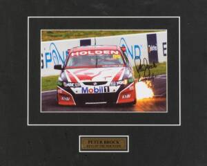 MOTOR RACING, group with ltd edition display comprising two negative photographs from Peter Brock's last race at Bathurst 1997; Mark Webber signed display; Mark Skaife display with power cable & light-up headlights; Holden Dealer Team bar mirror; plus two