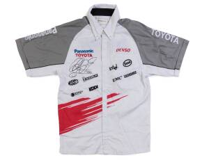 RALF SCHUMACHER, signature on Toyota shirt, with various embroidered sponsor's logos. Ex James Hird collection.