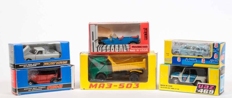 CCCP/USSR Group of Miscellaneous Brands Including RUSSOBALT: Riga 1915; And, LADA VAZ-2102; And, Dump Truck MA3-503. Most mint in original cardboard Packaging. (13 items)