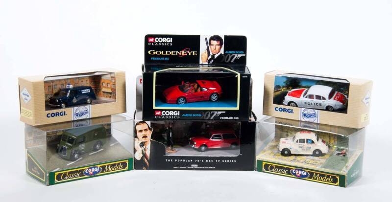 CORGI: Group of ‘Corgi Classics’ Model Cars Including James Bond Goldeneye Ferrari 355 (92978); And, Fawlty Towers Austin 1300 Estate & Basil Fawlty (802); And Morrison Mini Van (96956). All mint in original cardboard packaging. (45 items)