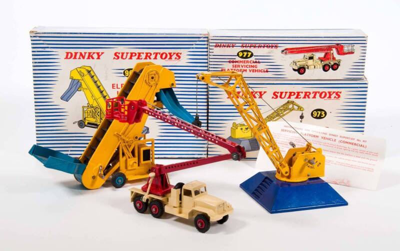 DINKY: 1950s Group of Commercial Vehicles Including Elevator Loader with Working Rubber Hopper Elevator and Chute (964); And, Goods Yard Crane on a Dark Blue Base with Hoisting, Slewing and Jib Raising Movements (973); And, Commercial Servicing Platform V