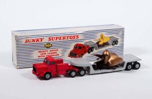 DINKY: 1950s Group of Large Trucks Including Tractor Trailer McLean (948); And, Pullmore Car Transporter (982) with Detachable loading Ramp (794); And, Mighty Antar Low Loader with Propeller (986). All vehicles mint in original blue and white striped lift