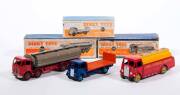 DINKY: Late 1940s to Early 1950s Group of Trucks Including Foden 14 Ton Tanker – Red Cab and Light Brown Rear Body (504); And, AEC ‘Shell Chemicals Ltd’ Tanker (591); And, Guy Flat Truck with Tailboard – Dark Blue Cab with Orange Tailboard and light blue