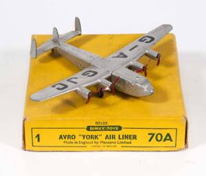 DINKY: Late 1950s Avro York Airliner with "G-A GJC" Markings (70A). Mostly mint except for slight damage to one propeller, in original yellow lift off Box. 