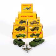 DINKY: 1950s Group of Military Vehicles Including Army Water Tanker (643); And Armoured Personnel Carrier (676); And, Scout Car (673). Most mint, all in original yellow cardboard boxes. Slight damage to some of the boxes. (8 items)