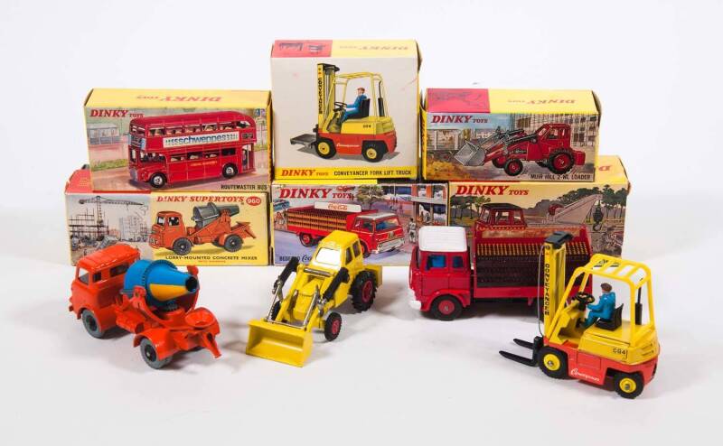 DINKY: Late 1960s to Early 1970s Group of Trucks Including Bedford Coca-Cola Truck (402); And, Muir Hill 2 WL Loader ‘Tailor Woodrow’ (437); And, Lorry-Mounted Concrete Mixer (960). All Mint in original cardboard pictured boxes. (6 items)