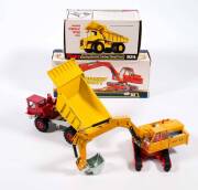 DINKY: 1970s Pair of Construction Vehicles Consisting of Atlas Digger (984) - Yellow Body & Arm, Silver Scoop; And, Aveling Barford Centaur Dump Truck (924) - Red Cab with Yellow Tipper. All mint in original white cardboard pictured boxes. (2 items)&nbsp;