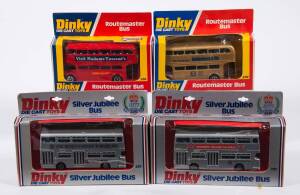 DINKY: Late 1970s Group of Busses Including ‘Woolworths’ Silver Jubilee Bus (297); And, ‘Madam Tussaud’s’ Routemaster Bus (289); And, ‘National’ Silver Jubilee Bus (297). All mint in original cardboard window boxes. Duplications present but are variants. 