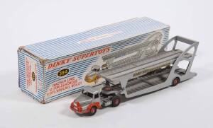 FRENCH DINKY: Late 1950s UNIC Articulated Car Transporter silver (39A) – Silver and Orange. Vehicle mint in an original but slight to medium damaged blue and white striped lift off box.   