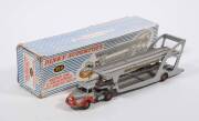 FRENCH DINKY: Late 1950s UNIC Articulated Car Transporter silver (39A) &ndash; Silver and Orange. Vehicle mint in an original but slight to medium damaged blue and white striped lift off box. &nbsp;&nbsp;