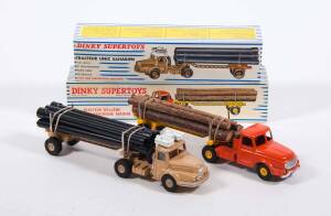 FRENCH DINKY: Early 1960s Pair of Articulated Goods Transport Trucks Consisting of Saharien Pipe Truck (893); And, Willeme Log Truck (897). Vehicle mint in an original blue and white striped lift off boxes. (2 items)