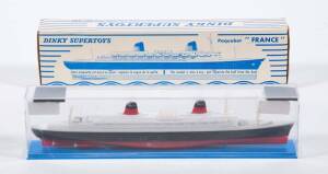 FRENCH DINKY: 1960s Steam Ship France (870). Mint in original perspex display case within a blue and white striped box.