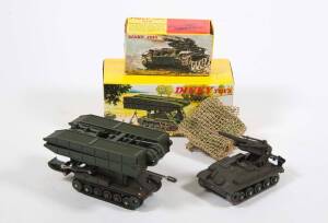 FRENCH DINKY: Late 1960s to Early 1970s Pair of Military Vehicles Consisting Bridgelaying Tank (883); And, AMX Tank 155 Gun (813) – with Original Camouflage Netting. Mint in original yellow cardboard pictured boxes.  (2 items)
