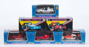 EIDAI GRIP: Group of Model Cars Including Marlboro McLaren M-26 (4); And, Imperial Lotus 78 (6); And, Ferrari Rainbow (12). All mint in original cardboard packaging. (9 items)