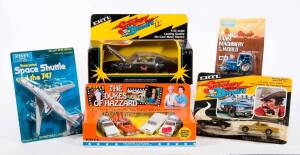 ERTEL: Group of Model Cars Including Smokey and the Bandit II (1644); And, Enterprise Space Shuttle and the 747 (1513); And, The Dukes of Hazzard General Lee Car (1791) Most mint in original cardboard packaging. (50 items approx.)