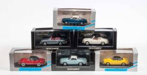 MINICHAMPS: 1:43 Group of VW Karmann Ghia Including Karmann Ghia Cabriolet Light Blue (5031); And, Karmann Ghia Cabriolet Black (5030); And, 1955 Karmann Ghia Coupe (5004). All mint in original display case (10 items) 