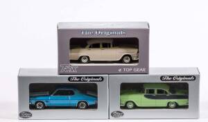 TRAX: 1:43 Group of Holden Model Cars Including 1960 FB Special Sedan (TR20E); And, 1971 HQ Monaro GTS 350 (TR18D); And, 1971 HQ Monaro Coupe (TR18). All mint in original display case with accompanying labels. (23 items)