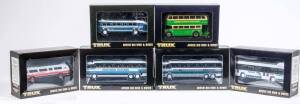 TRUX: 1:76 Group of 'Aussie Big Rigs & Busses' Models Including 1954 Ansair Flxible Clipper (TX15C); And, 1980 Denning Mono Coach (TX16B); And, 1940 Leyland TD5c Titan Double Decker Bus (TX13). All mint in original display cases. (21 items)
