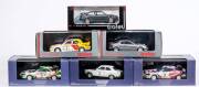 TROFEU: 1:43 Group of Model Cars Including Mitsubishi Galant VR4 European Champion 92 (040); And, Toyota Celica 4x4 1st Safari 95 (045); And, Ford Escort 1600 TC 1st Victory -Ireland 68 (505). All mint in original display case. (24 items)  